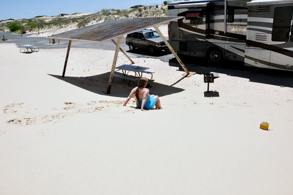 Karen Duquette going down the sand hill.